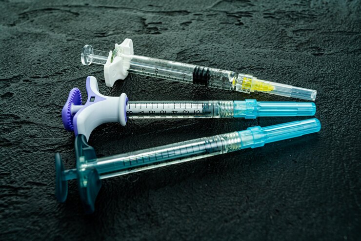 high-angle-view-syringes-table_1048944-2703975
